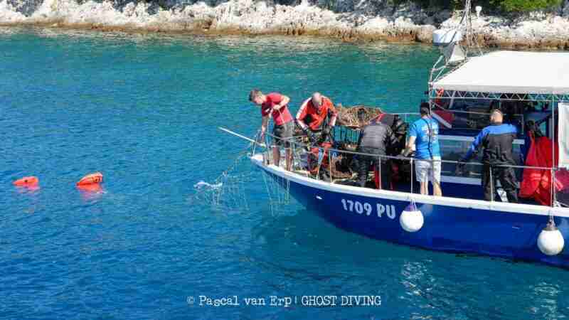 Healthy Seas volunteers collecting nets at sea